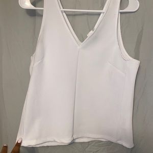 White sleeveless blouse